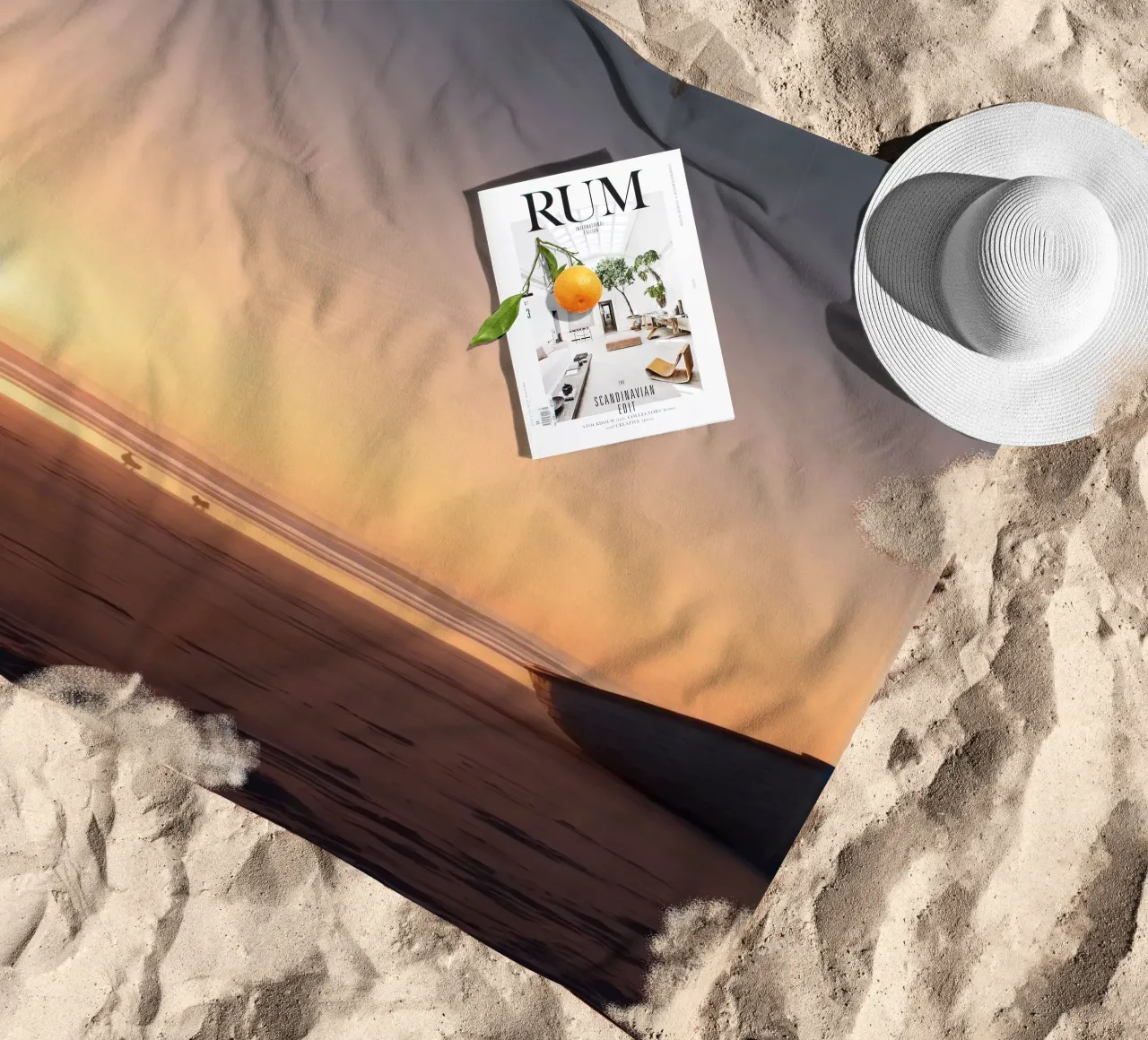 Sunset view with a lone boat on a tranquil beach showcasing beach towel by DesignDoodle