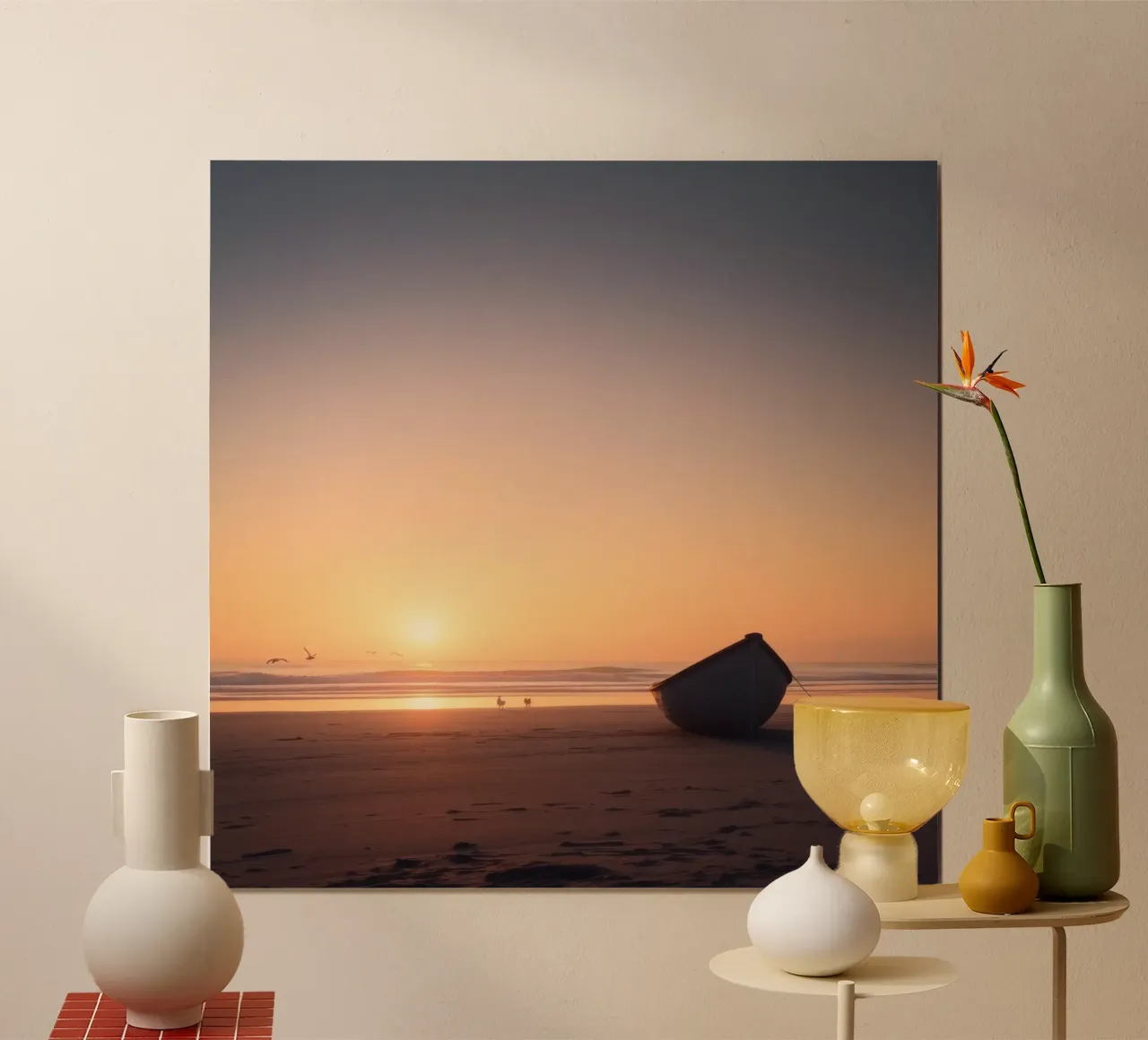 Sunset view with a lone boat on a tranquil beach showcasing hahnemühle by DesignDoodle
