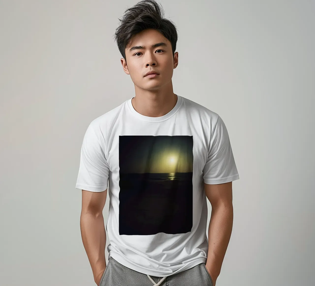 Moonlit beach night with shimmering water under a clear sky t-shirt by DesignDoodle