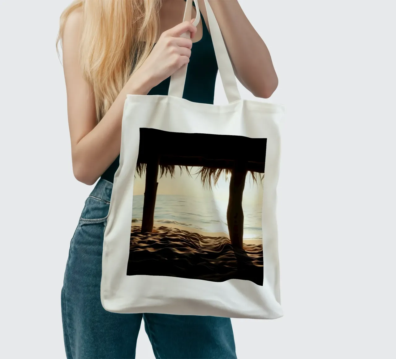 Sunset view from a beach hut overlooking calm waters tote bag by DesignDoodle
