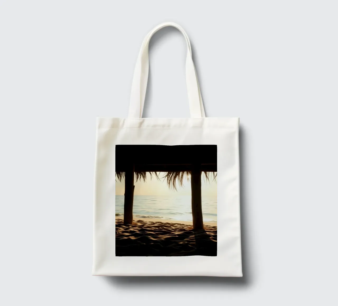 Sunset view from a beach hut overlooking calm waters tote bag by DesignDoodle