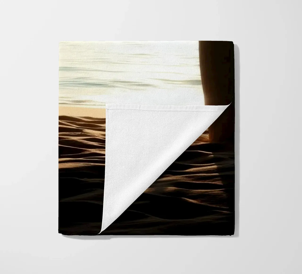 Sunset view from a beach hut overlooking calm waters beach towel by DesignDoodle