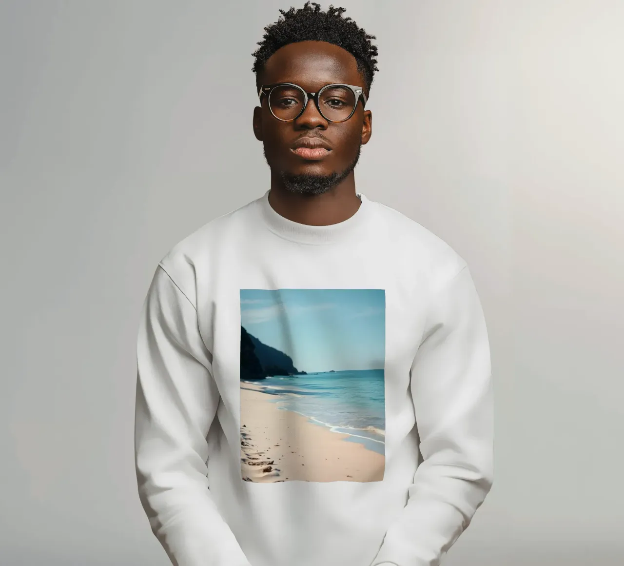 Serene coastline with soft waves lapping against pristine sweatshirt by DesignDoodle