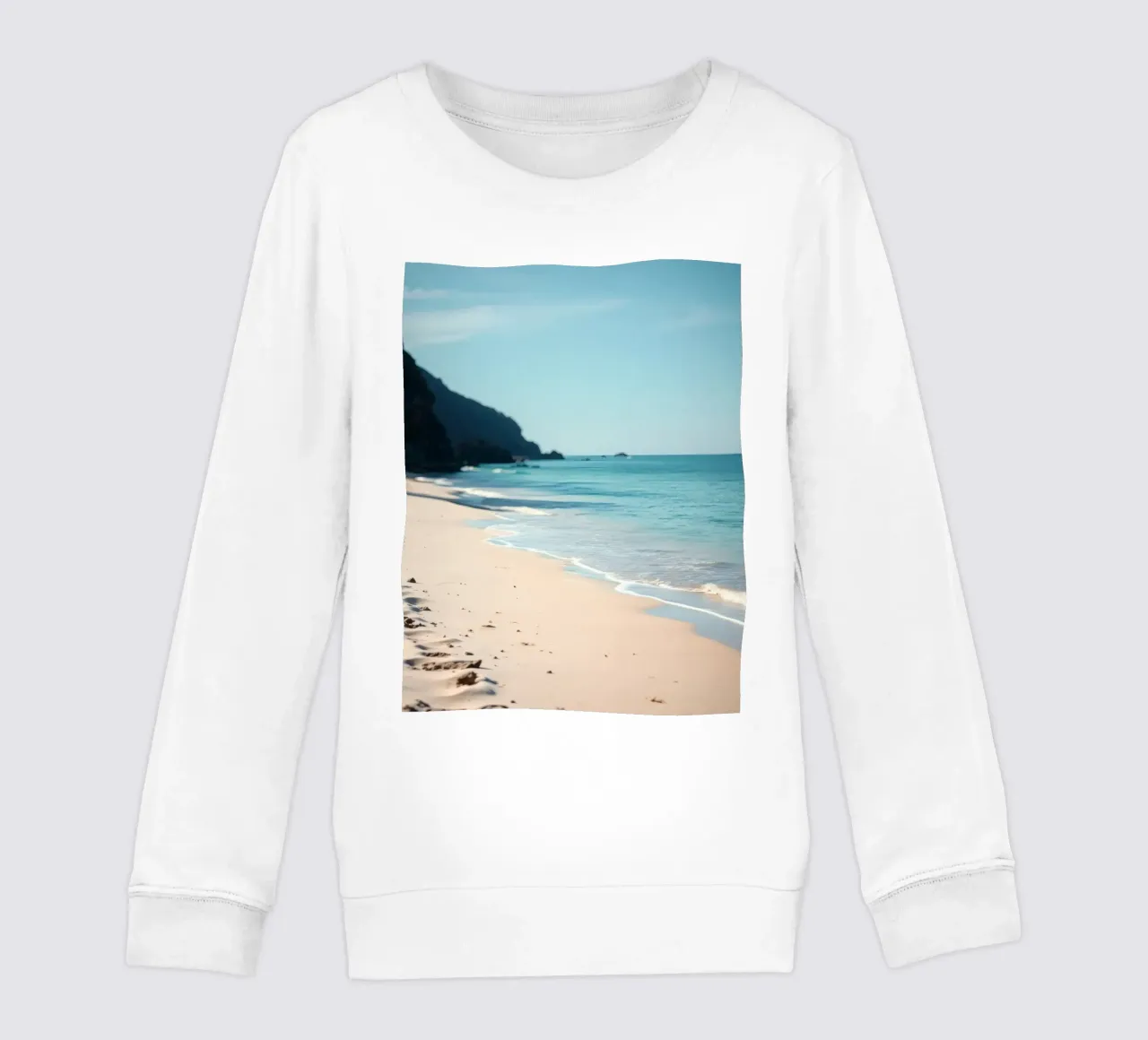 Serene coastline with soft waves lapping against pristine kids sweatshirt by DesignDoodle