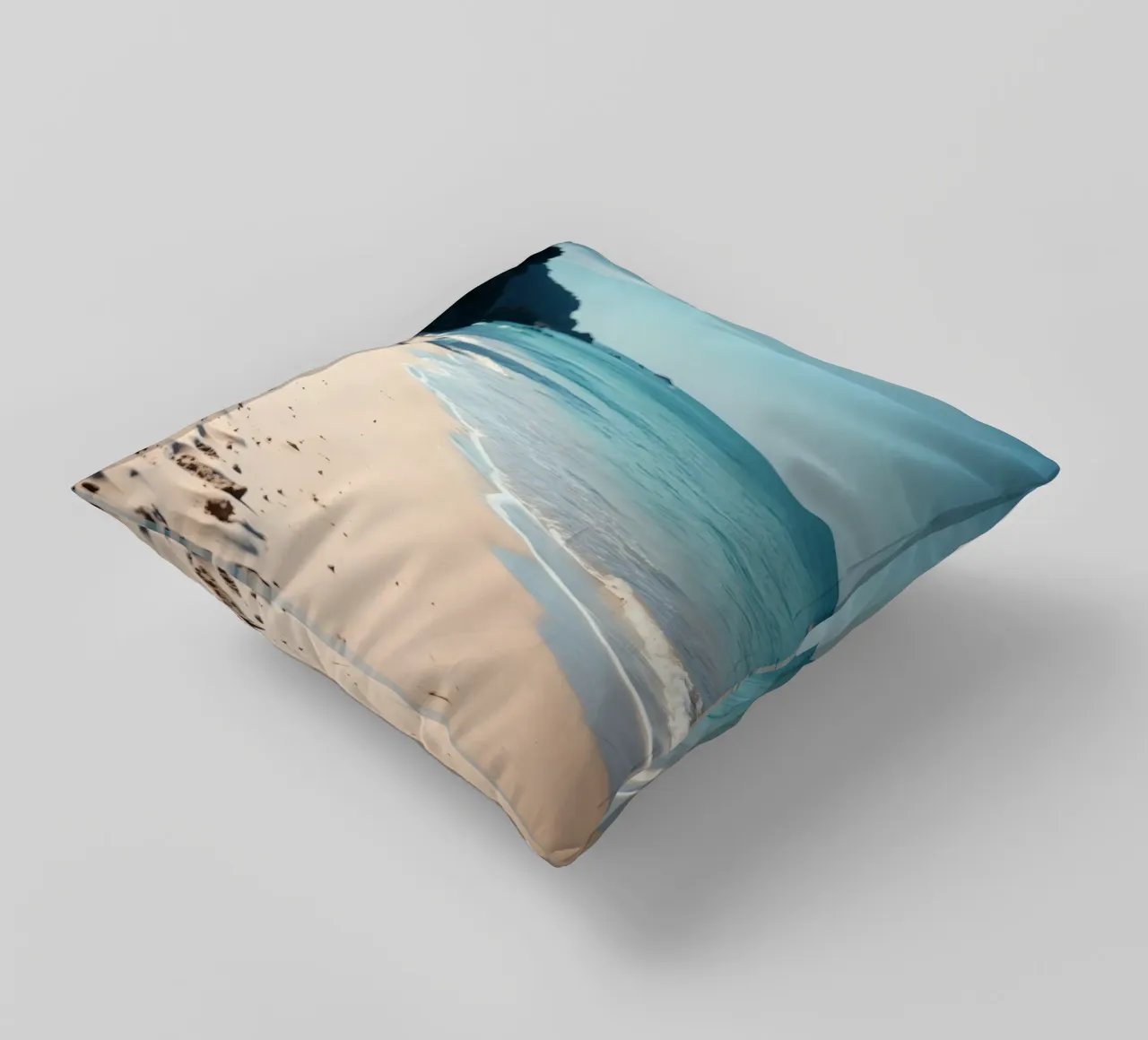 Serene coastline with soft waves lapping against pristine decorative cushion by DesignDoodle