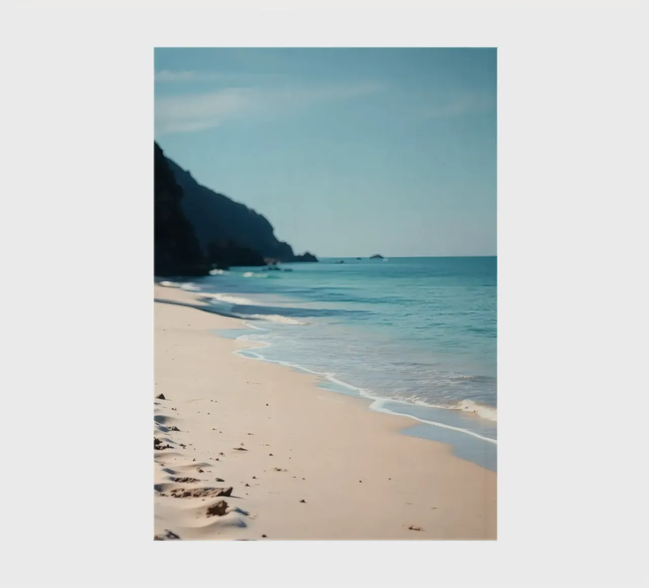 Serene coastline with soft waves lapping against pristine notebook by DesignDoodle
