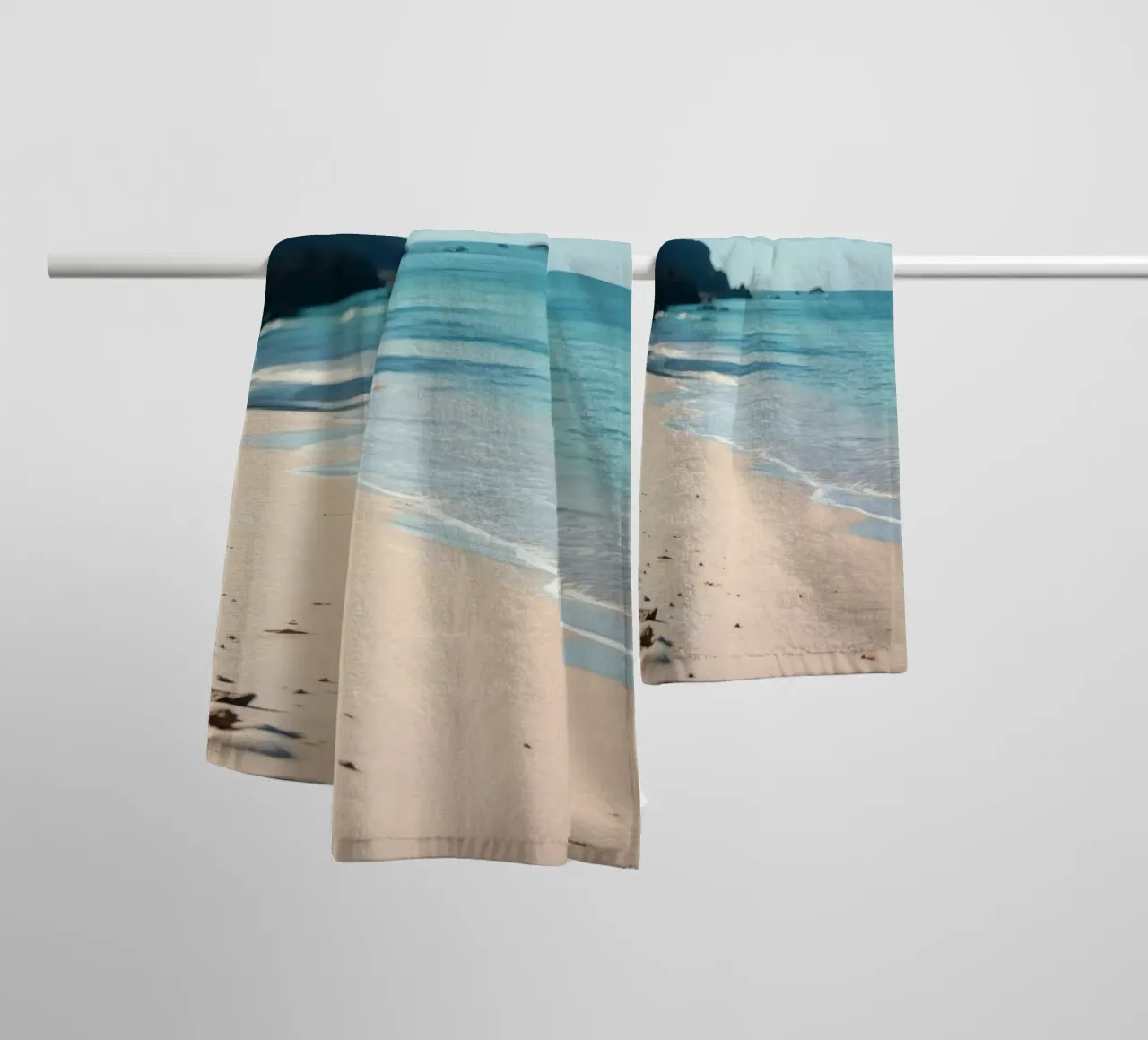 Serene coastline with soft waves lapping against pristine towel by DesignDoodle