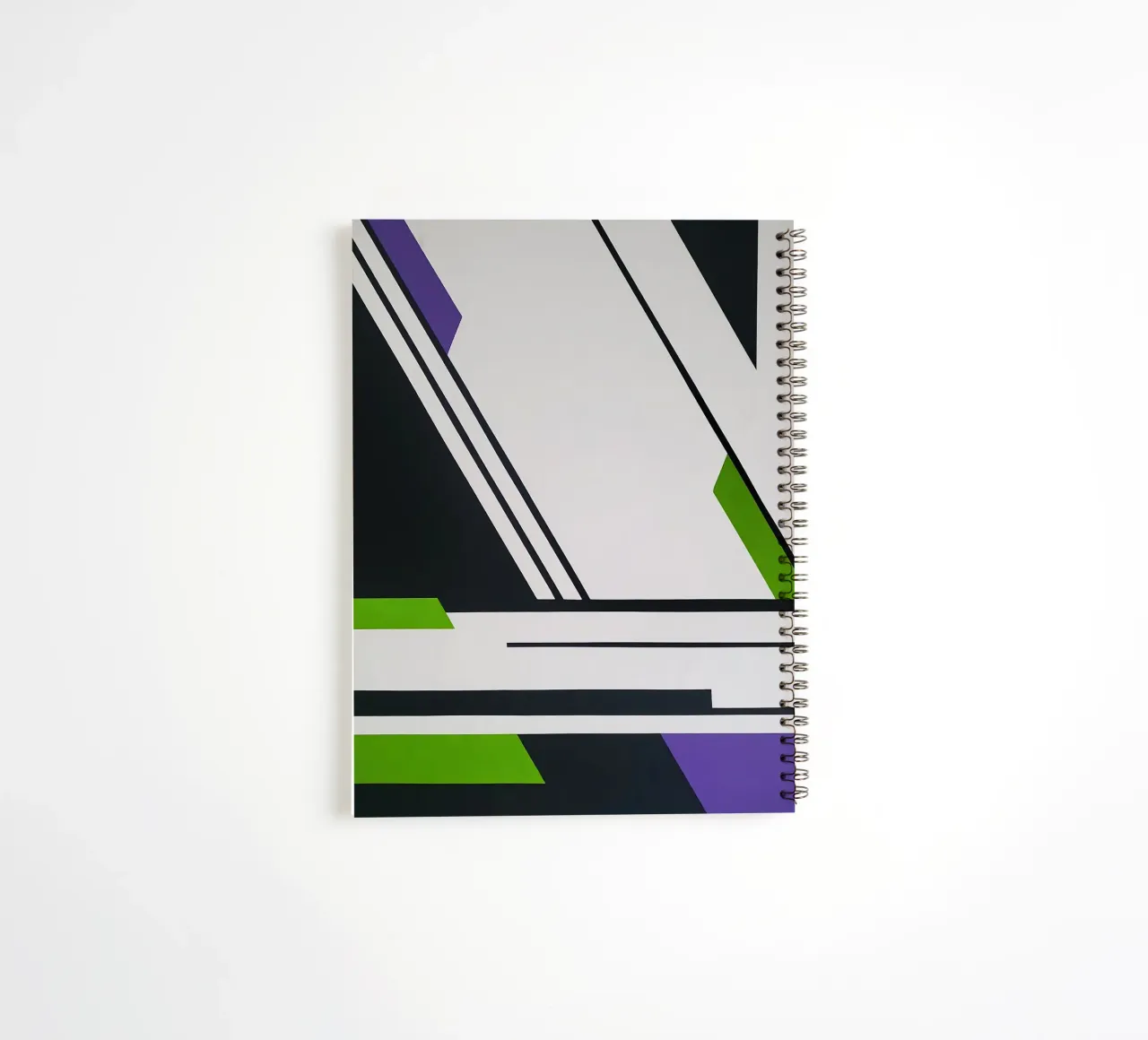 Sharp Angles and Bold Lines in Green and Purple spiral notebook by Artbyvo