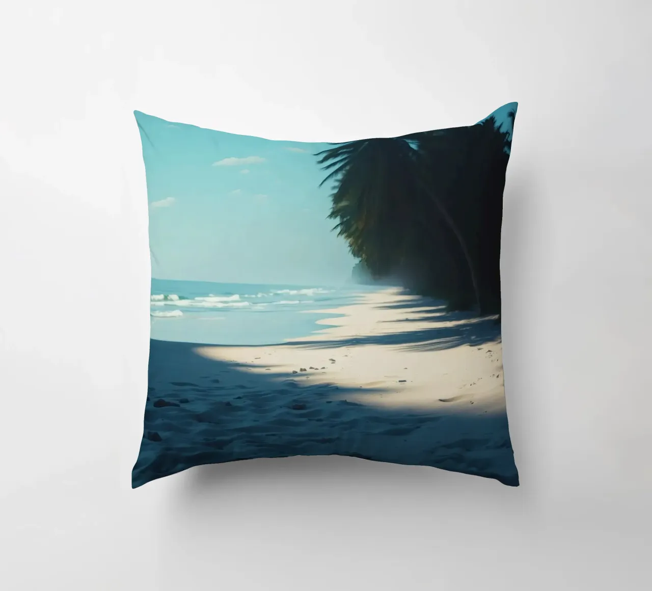 Serene beach with palm trees and gentle waves under a clear decorative cushion by DesignDoodle