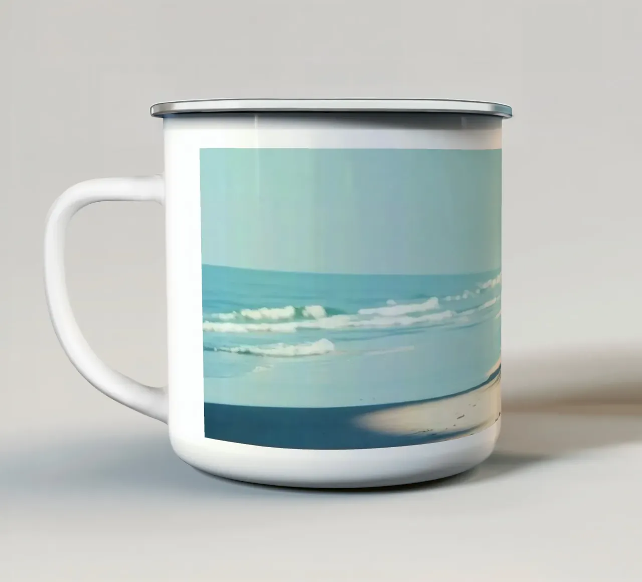Serene beach with palm trees and gentle waves under a clear enamel mug by DesignDoodle