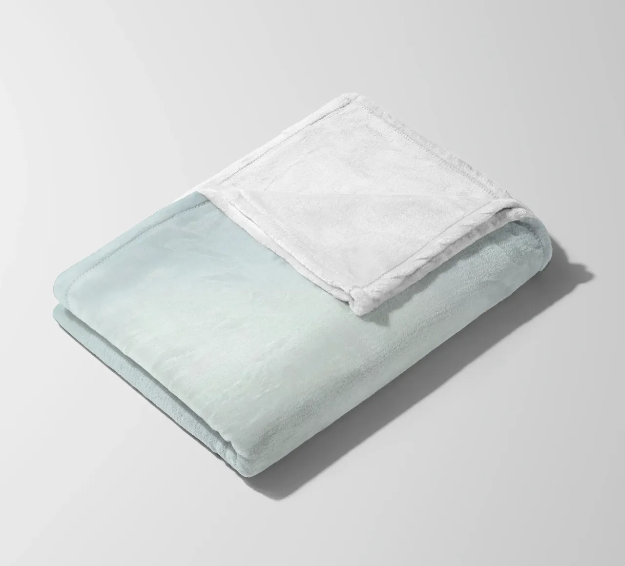 Clear blue sky with leafy branches contrasting fleece blanket by DesignDoodle