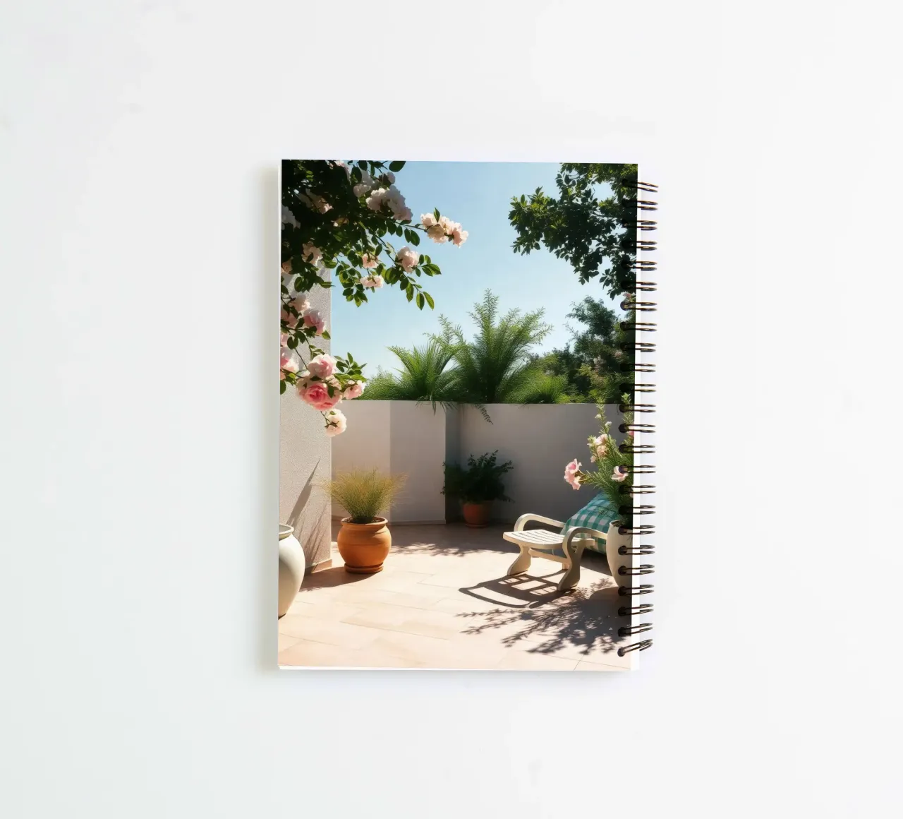 Bright tranquil outdoor patio adorned with blooming flower spiral notebook by DesignDoodle