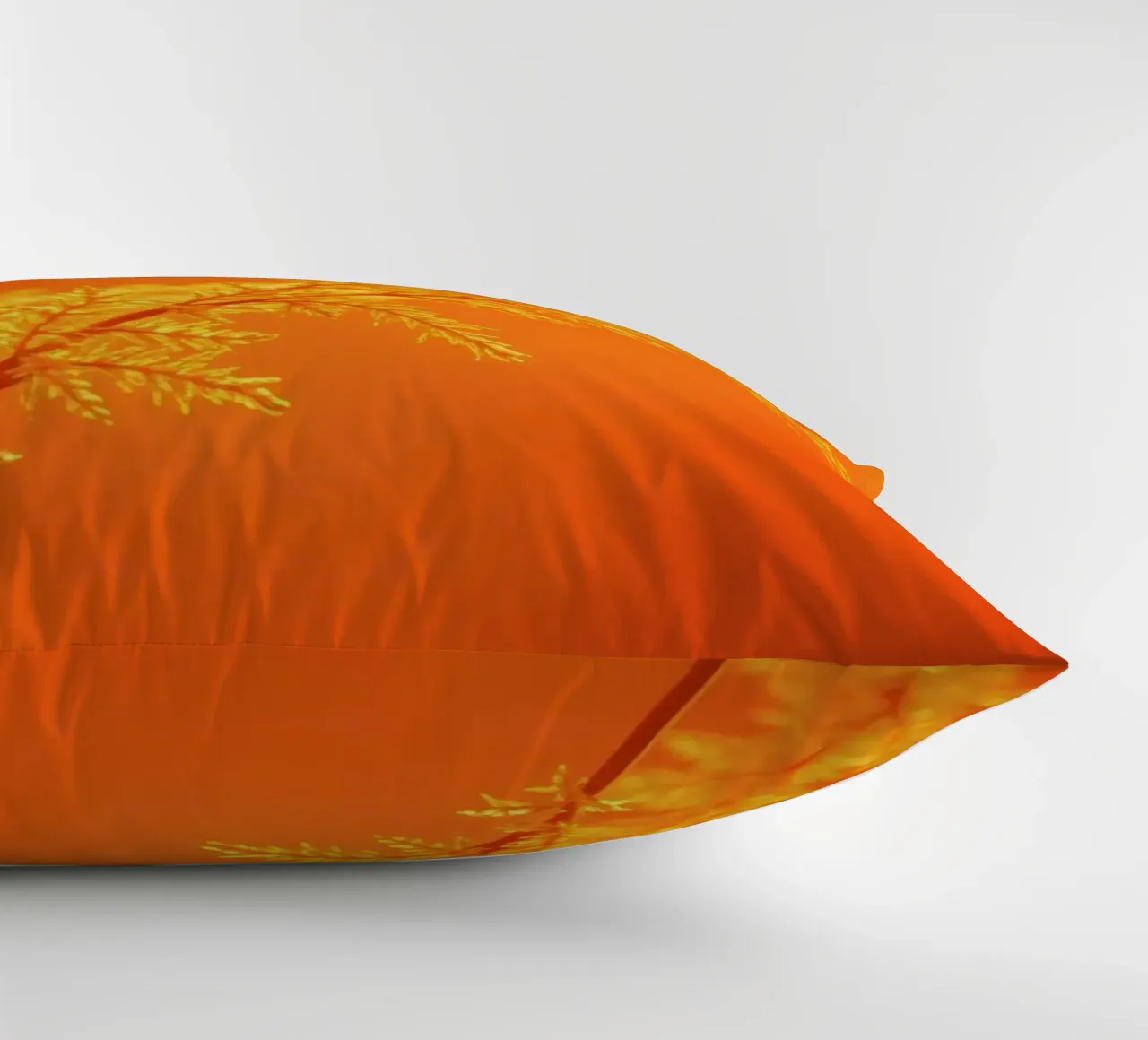Vibrant golden background with delicate foliage illuminated decorative cushion by DesignDoodle