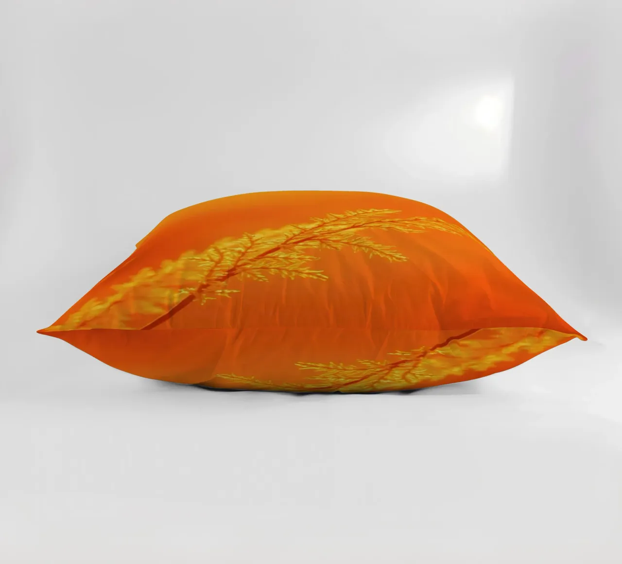 Vibrant golden background with delicate foliage illuminated decorative cushion by DesignDoodle
