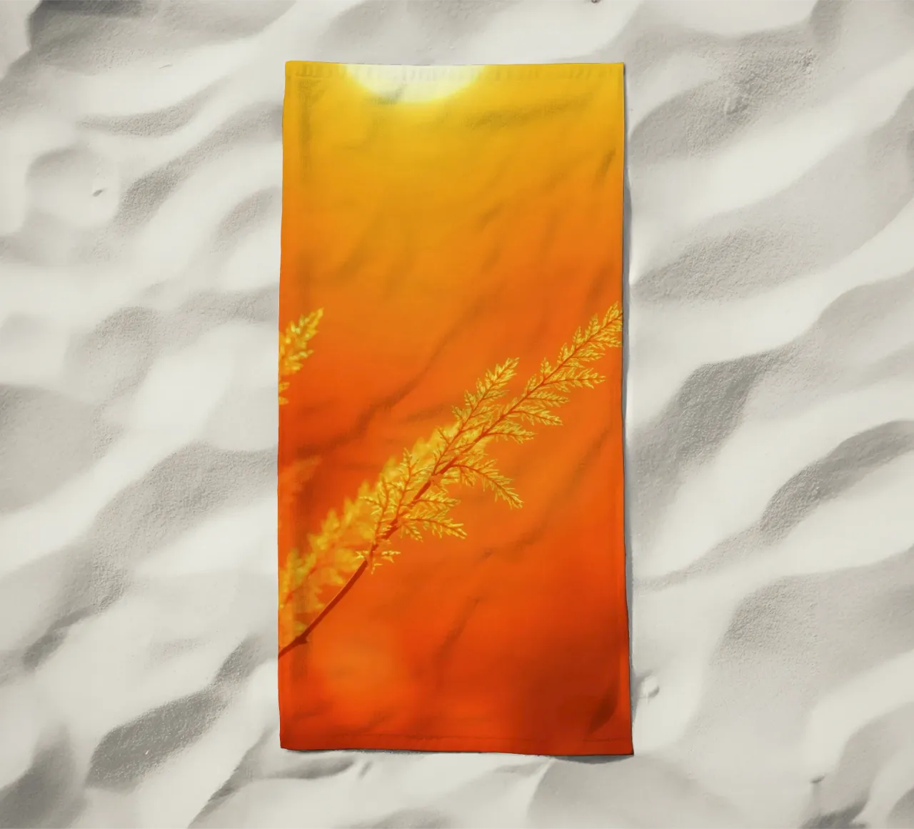 Vibrant golden background with delicate foliage illuminated beach towel by DesignDoodle