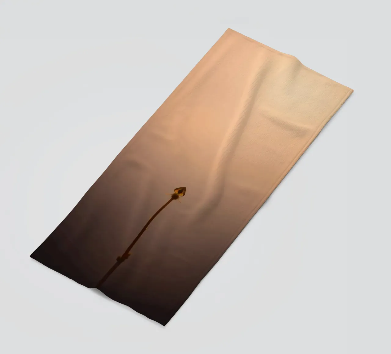 Elegant plant silhouette against a soft gradient background beach towel by DesignDoodle