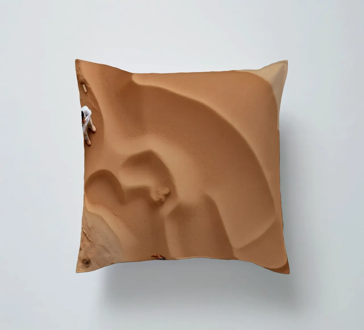 Esplorare l'arte dei modelli di sabbia e l'interazione umana cuscino da DesignDoodle