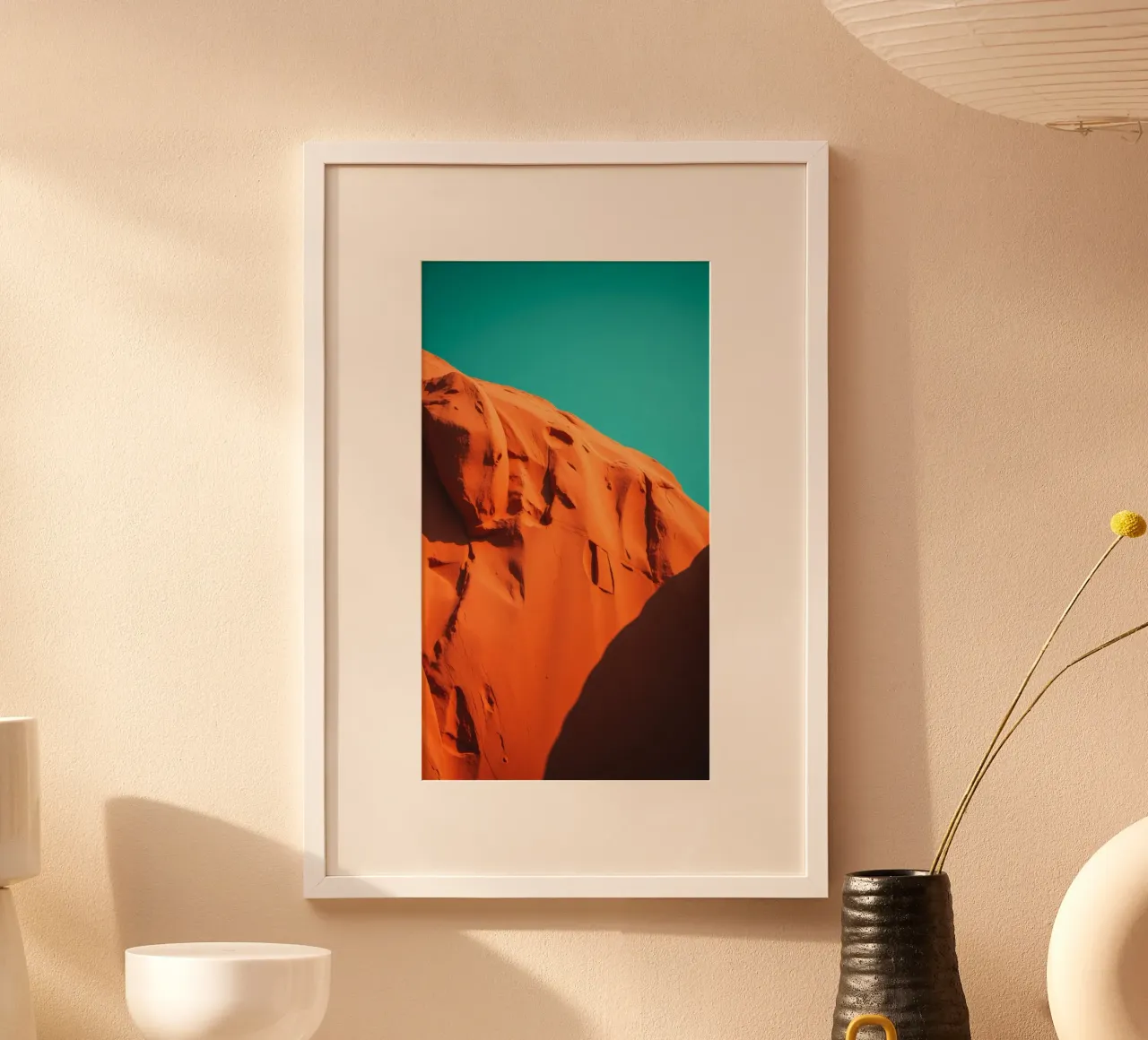 Formations rocheuses orange vif sous un ciel bleu clair poster de DesignDoodle