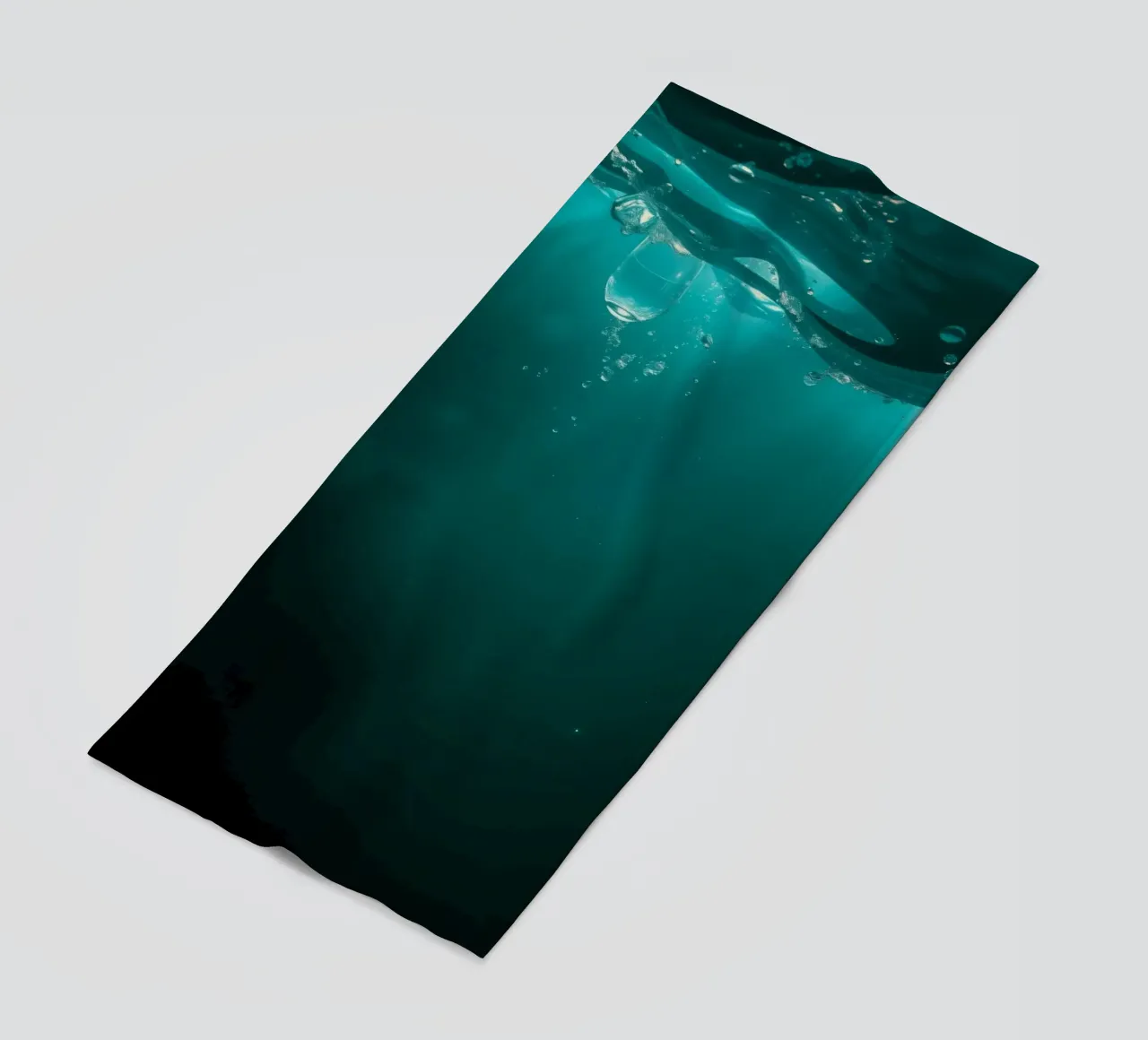 Explore the serenity of underwater tranquility beach towel by DesignDoodle