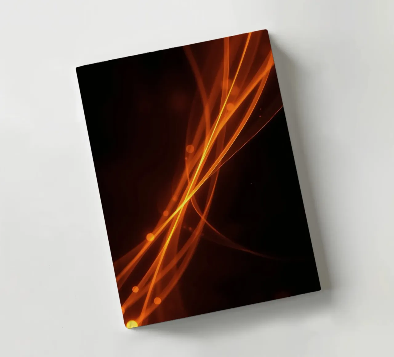 Vibrant orange abstract background with flowing lines notebook by DesignDoodle
