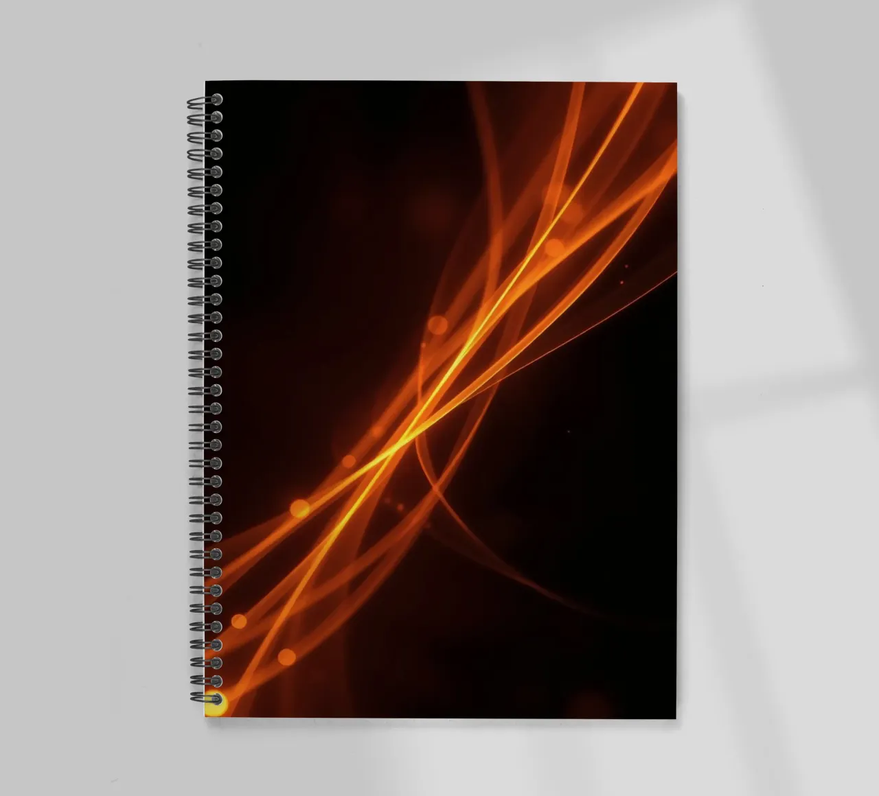 Vibrant orange abstract background with flowing lines spiral notebook by DesignDoodle