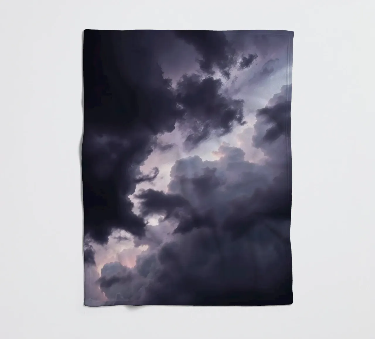 Dark and moody cloud formations create a dramatic sky fleece blanket by DesignDoodle