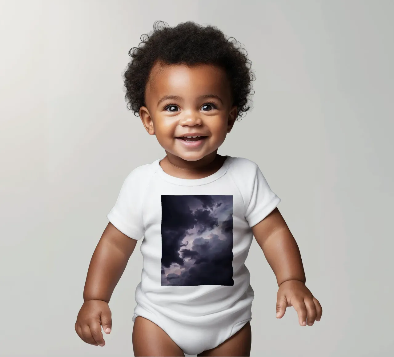 Dark and moody cloud formations create a dramatic sky short-sleeve baby romper by DesignDoodle