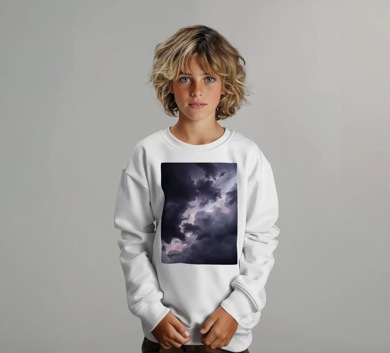 Dark and moody cloud formations create a dramatic sky kids sweatshirt by DesignDoodle