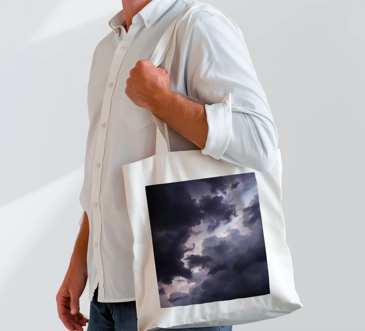 Dark and moody cloud formations create a dramatic sky tote bag by DesignDoodle
