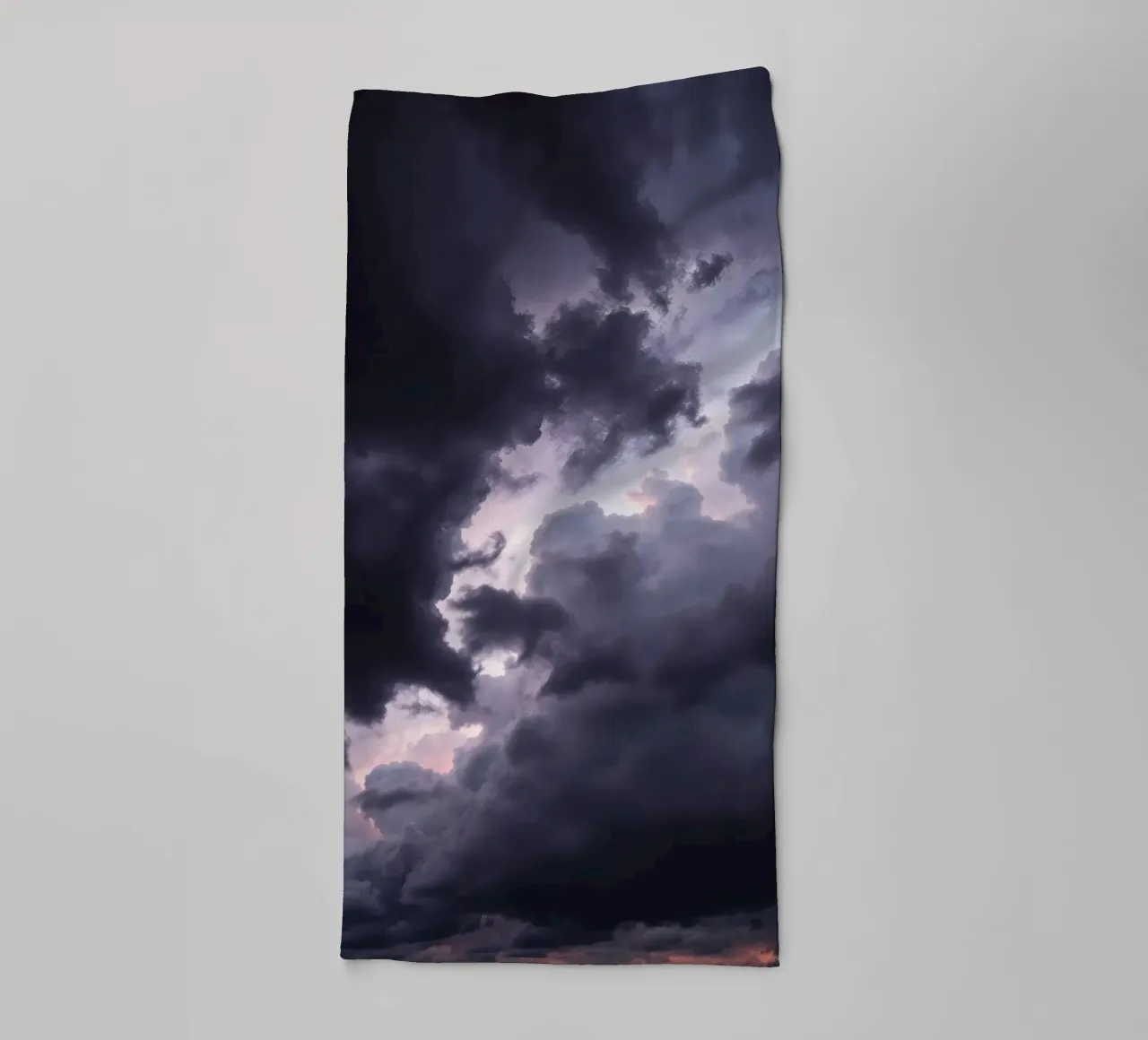 Dark and moody cloud formations create a dramatic sky towel by DesignDoodle