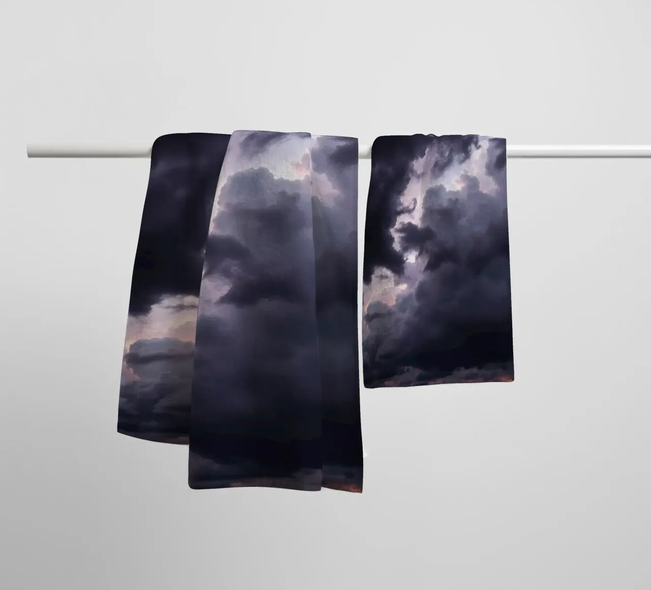 Dark and moody cloud formations create a dramatic sky towel by DesignDoodle