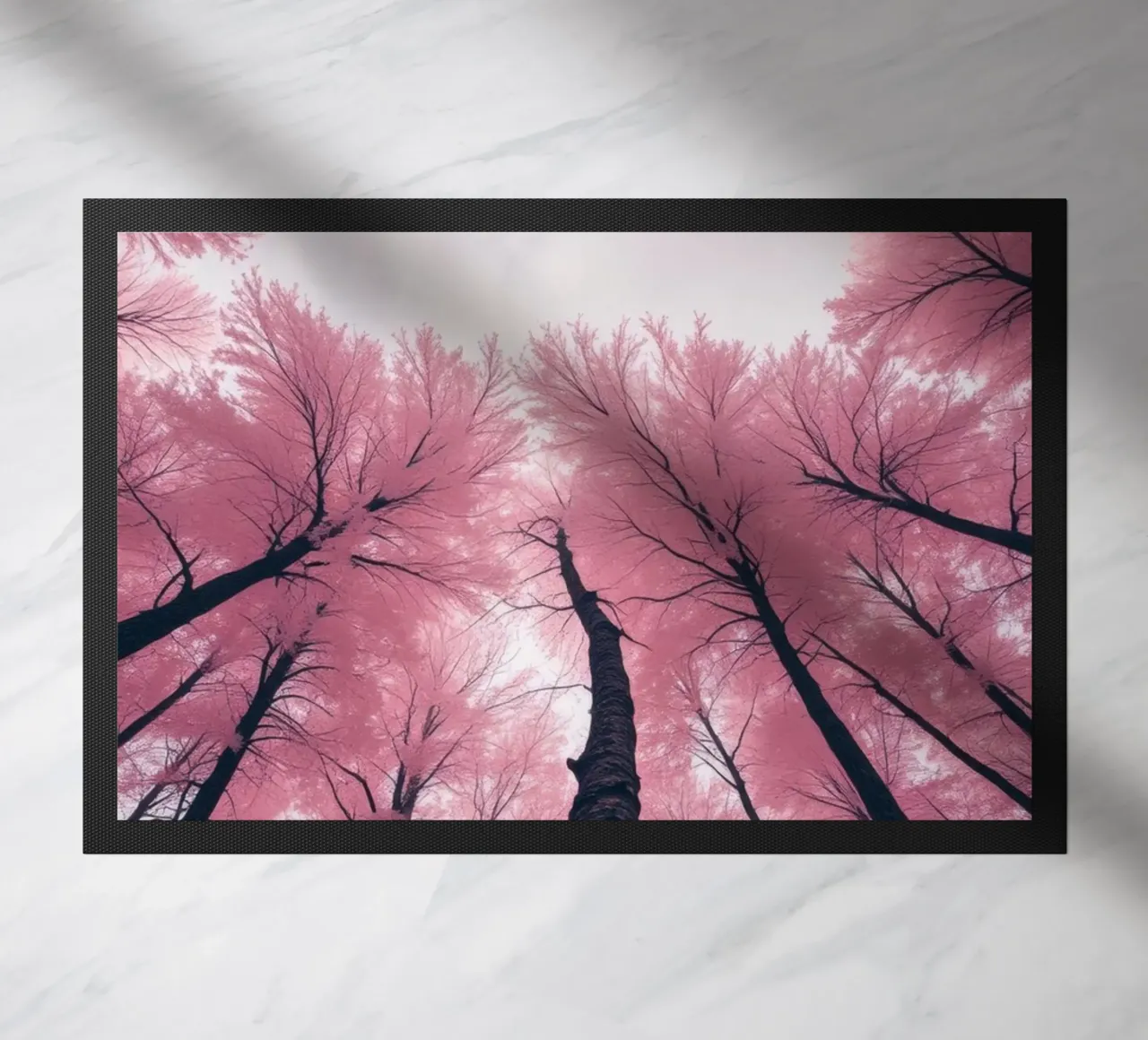 Vibrant abstract pink trees against a cloudy sky doormat by DesignDoodle