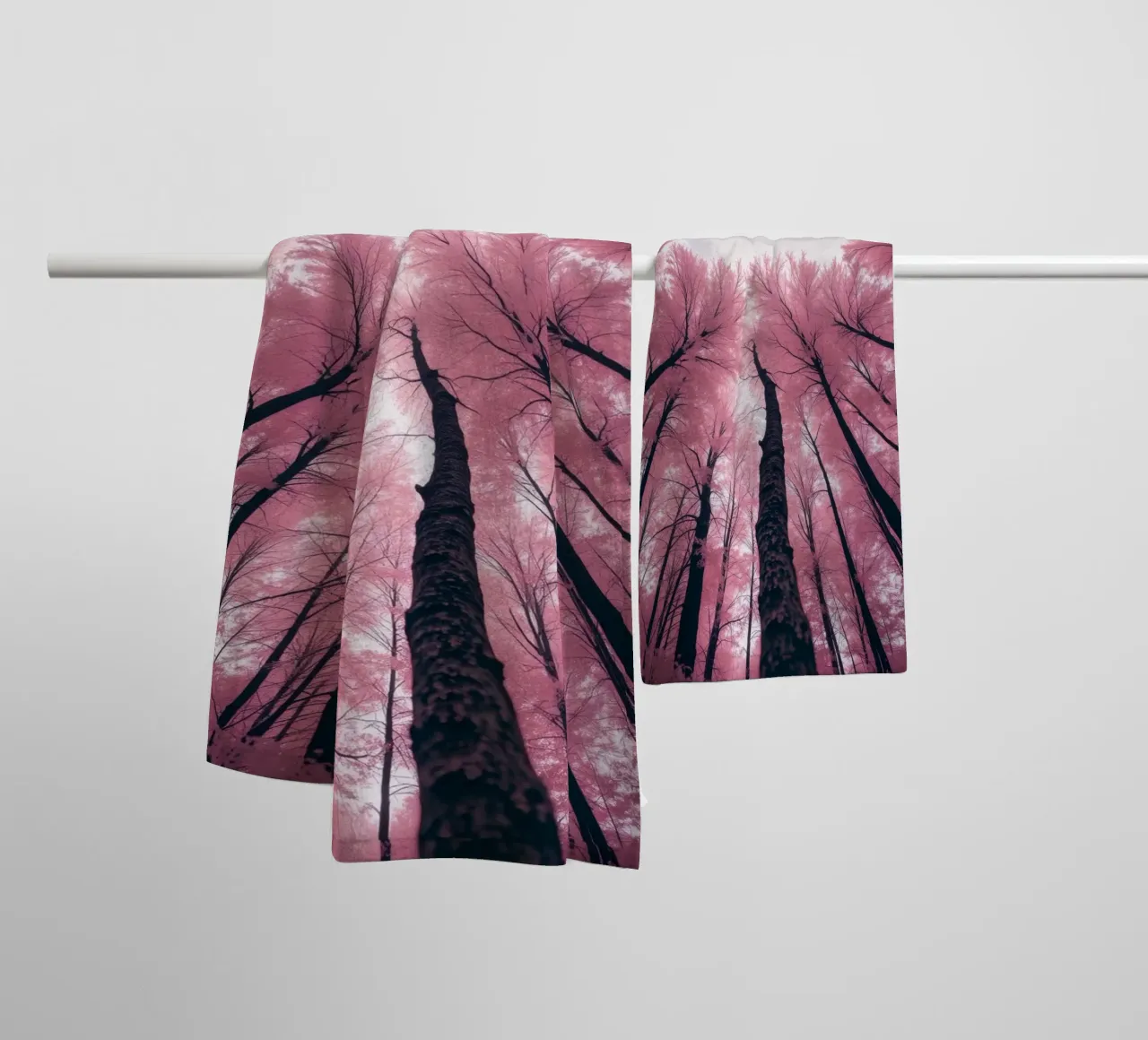 Vibrant abstract pink trees against a cloudy sky towel by DesignDoodle