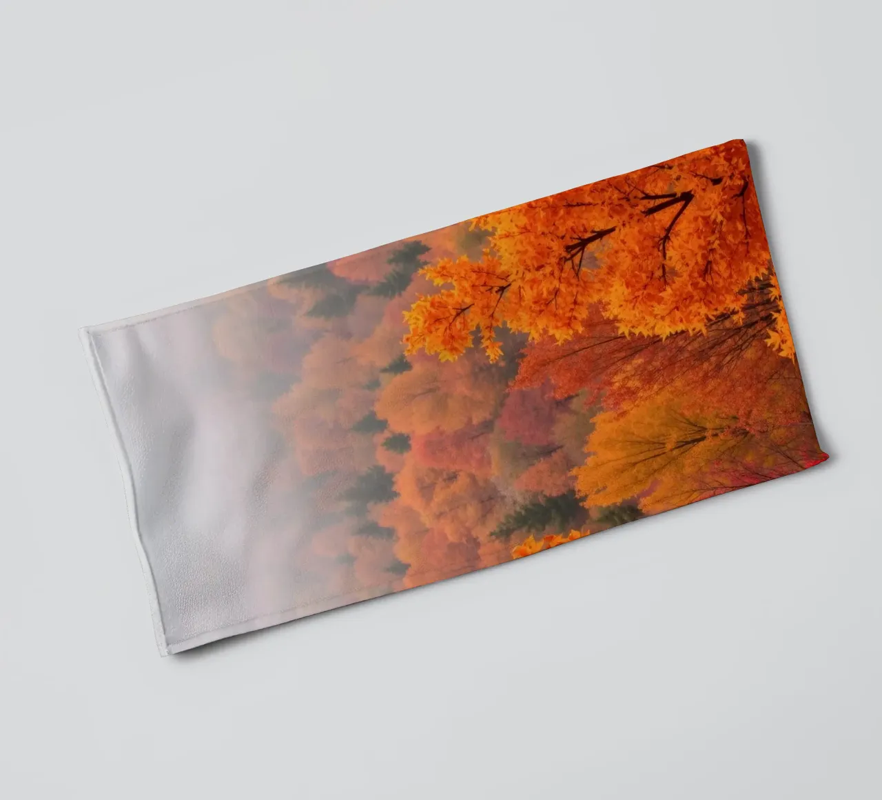 fall foliage creating a stunning backdrop in a misty forest towel by DesignDoodle