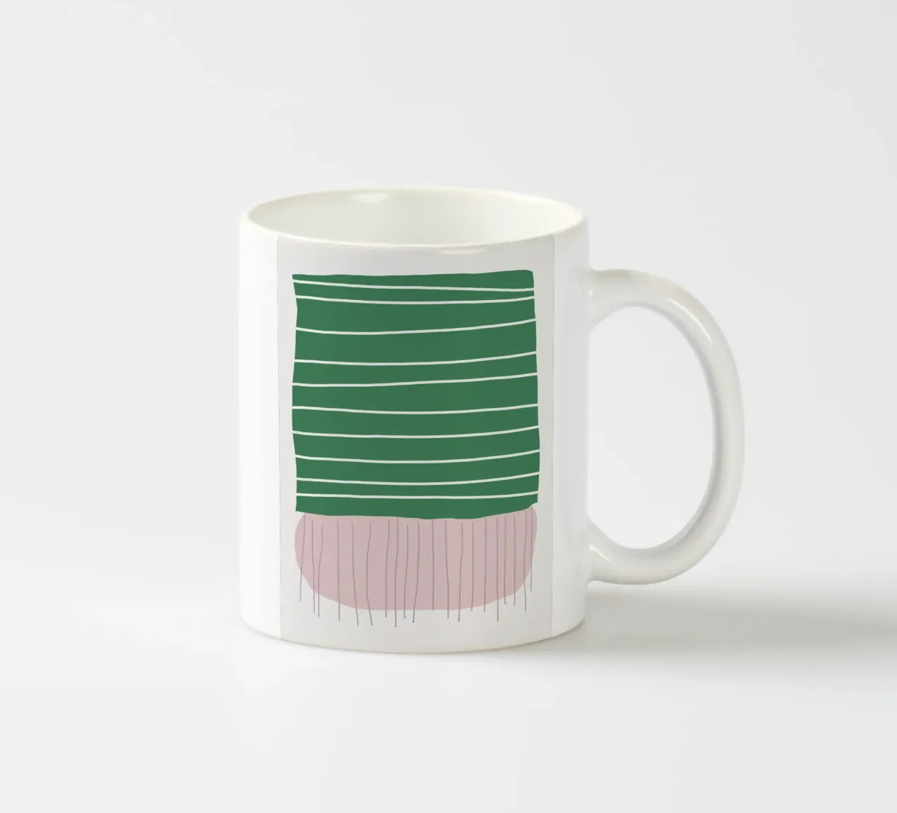 Simple forms of pink and green ceramic mug by Little Dean