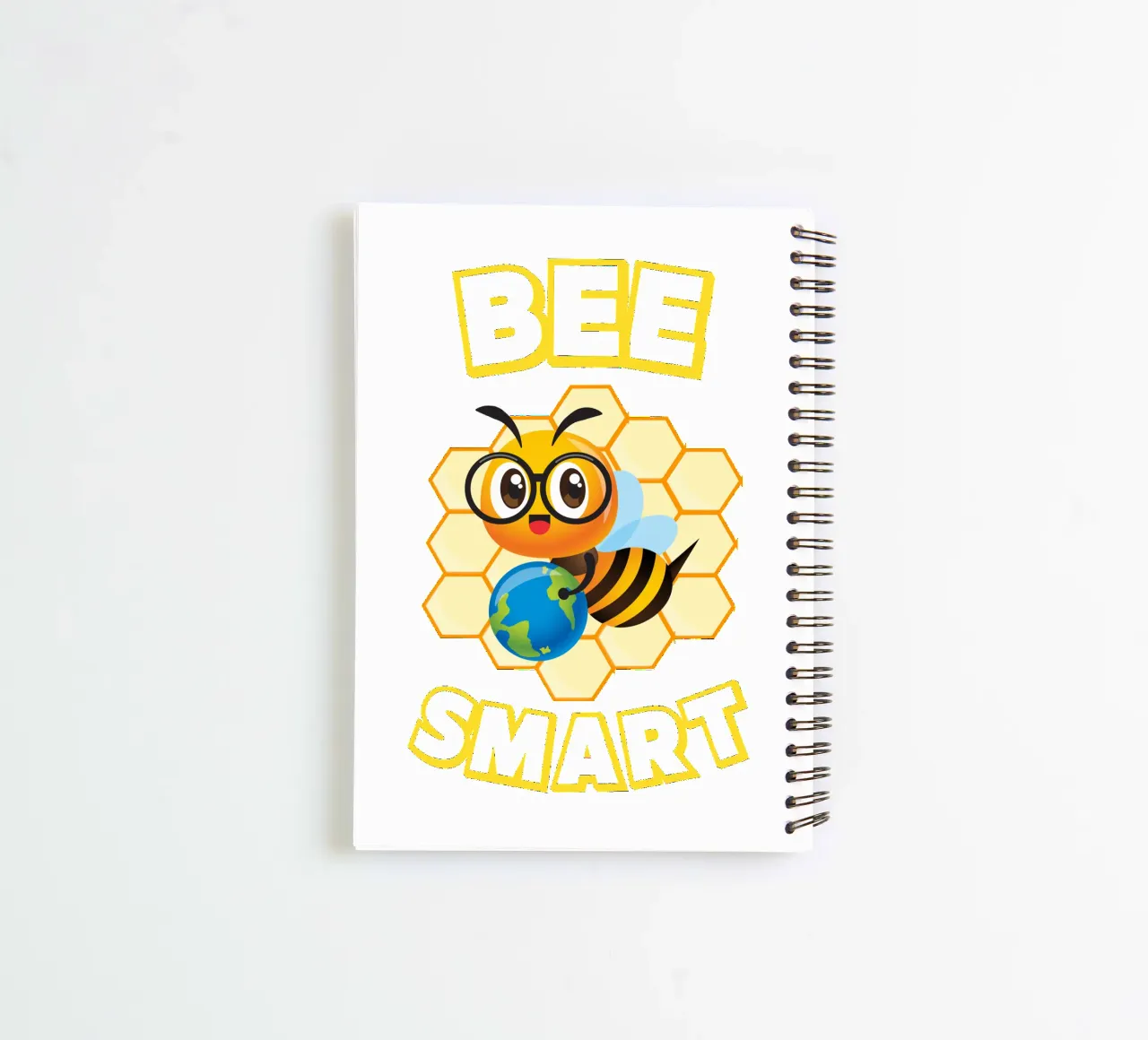 Bee with glasses and globe in front of yellow honeycomb spiral notebook by ArtDesign by KBK