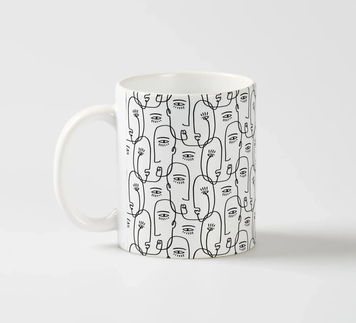 Face Pattern ceramic mug by treechild