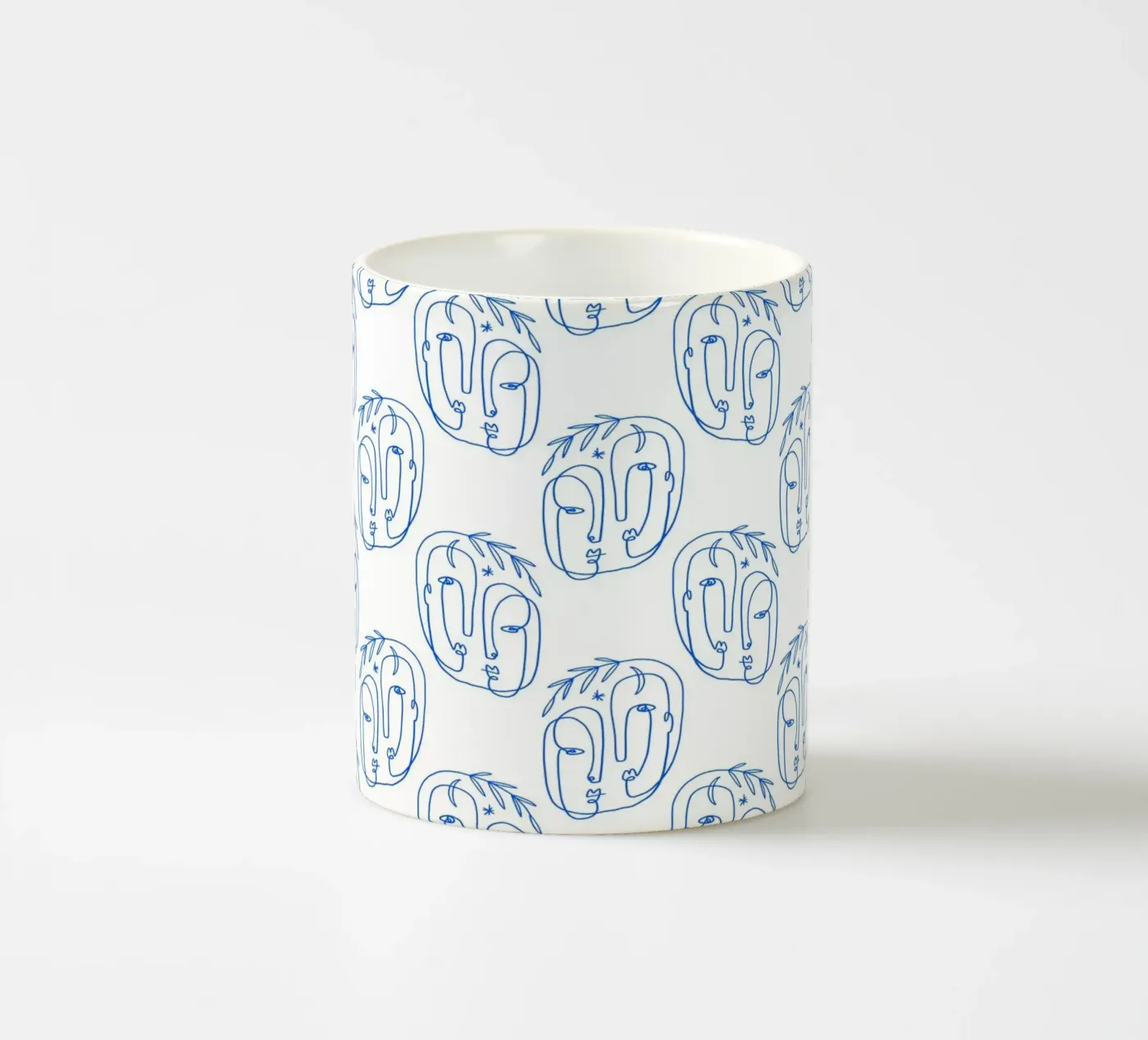 Faces Pattern ceramic mug by treechild