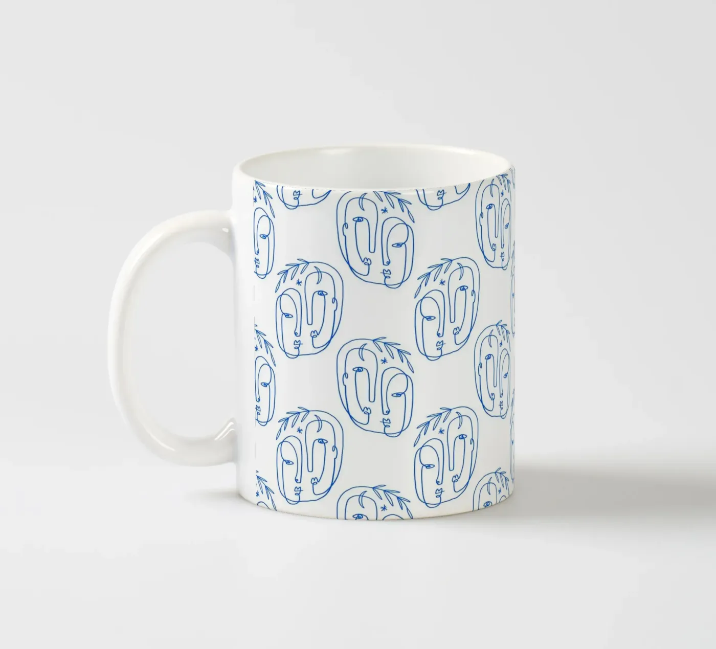 Faces Pattern ceramic mug by treechild