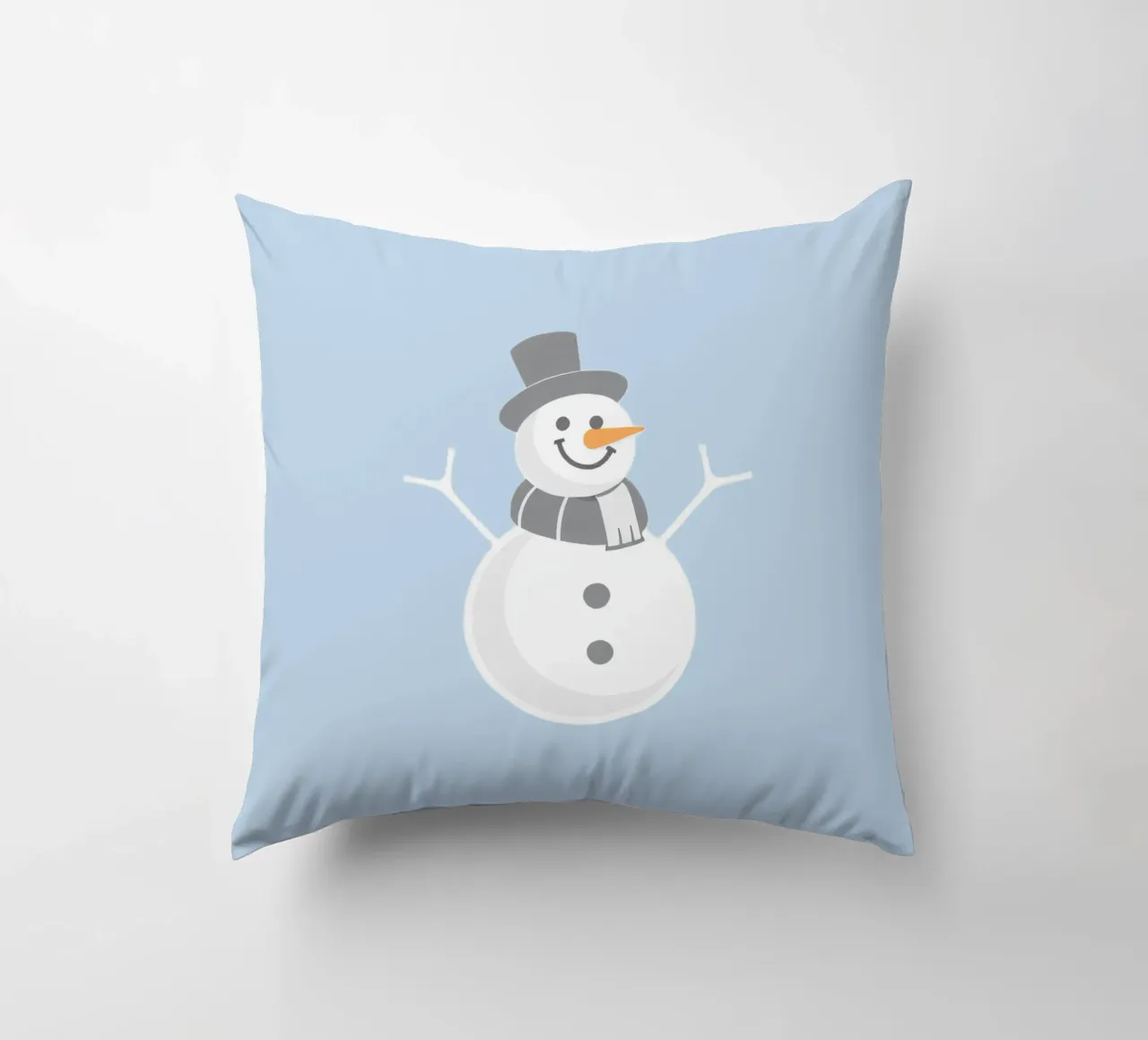 Un allegro pupazzo di neve che indossa un cappello nero e una sciarpa grigia cuscino da DesignDoodle