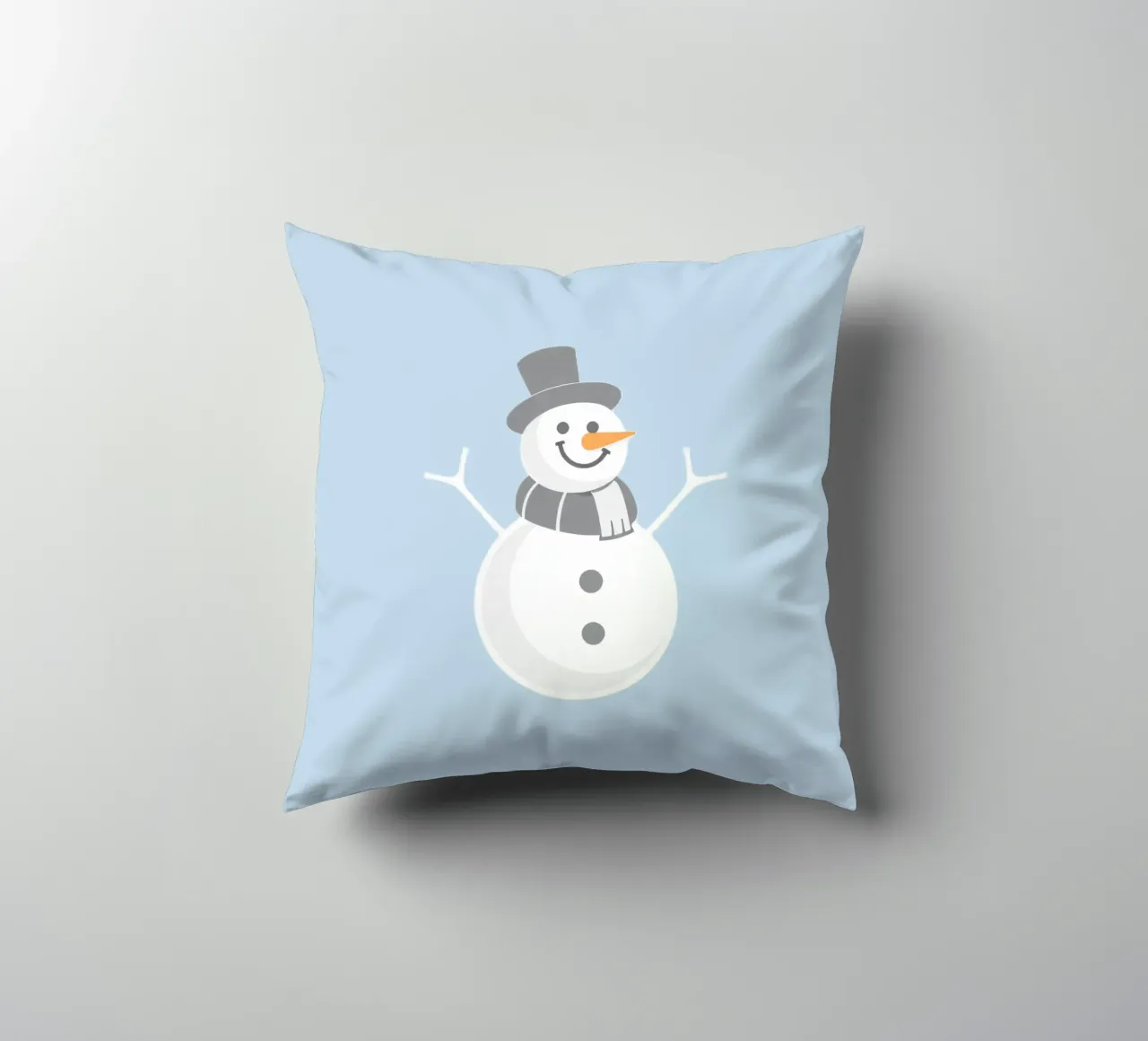 Un allegro pupazzo di neve che indossa un cappello nero e una sciarpa grigia cuscino da DesignDoodle