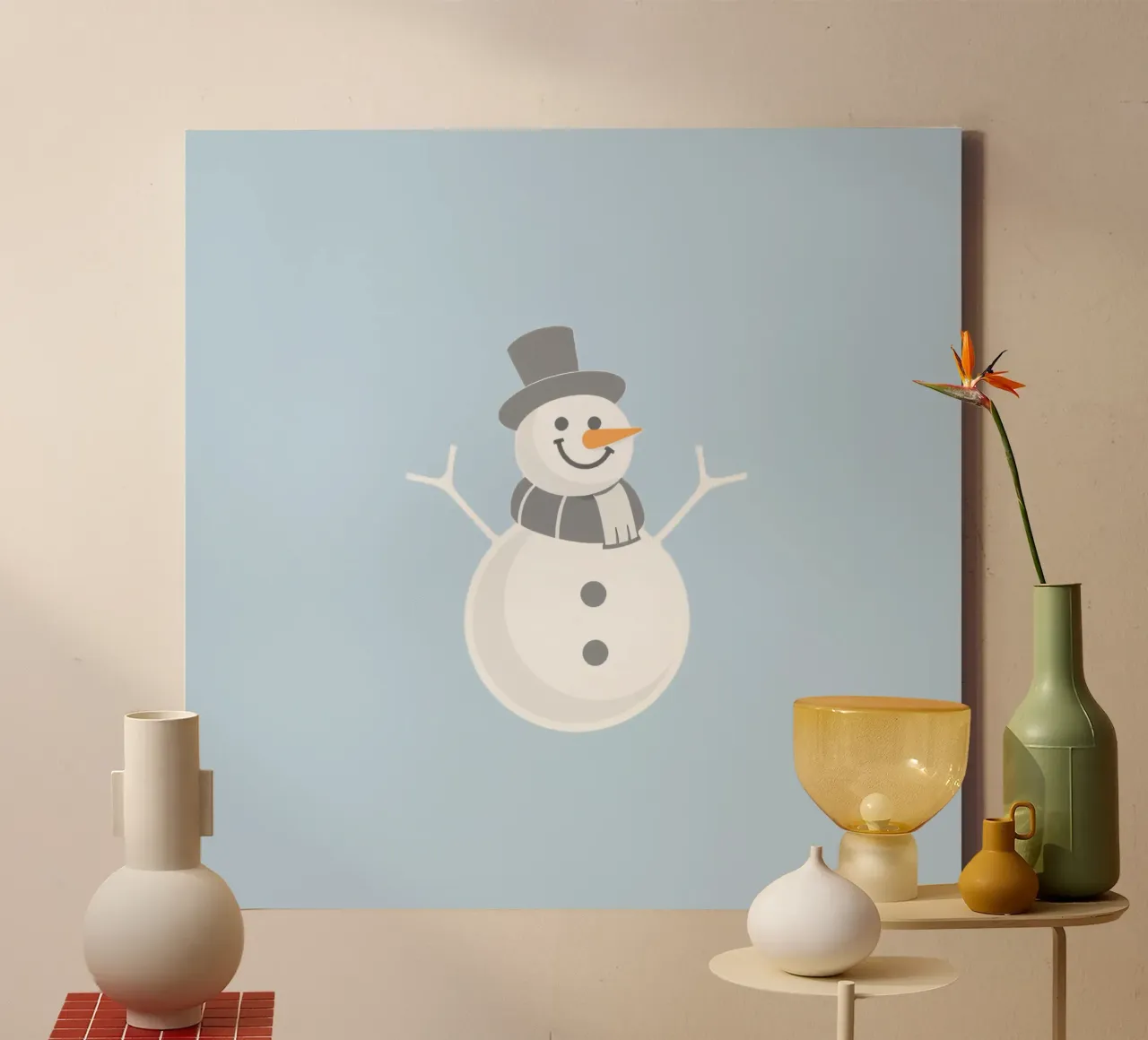 Un allegro pupazzo di neve che indossa un cappello nero e una sciarpa grigia tela da DesignDoodle