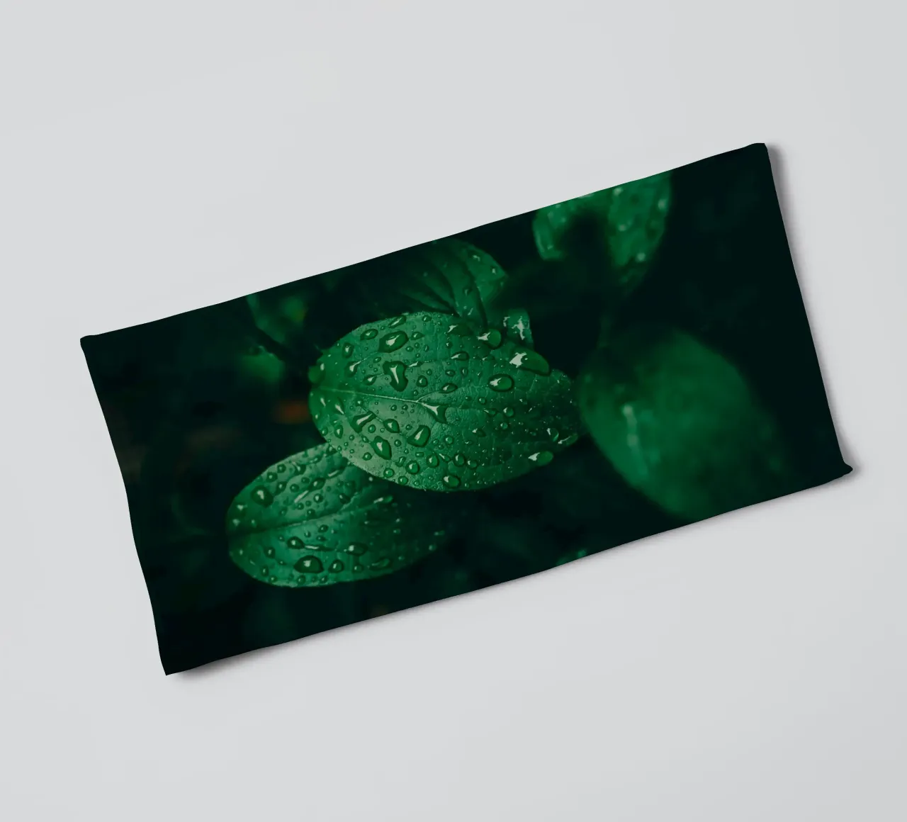 Dark leaf with raindrops - Moody macro plant photo towel by Bold and Retro