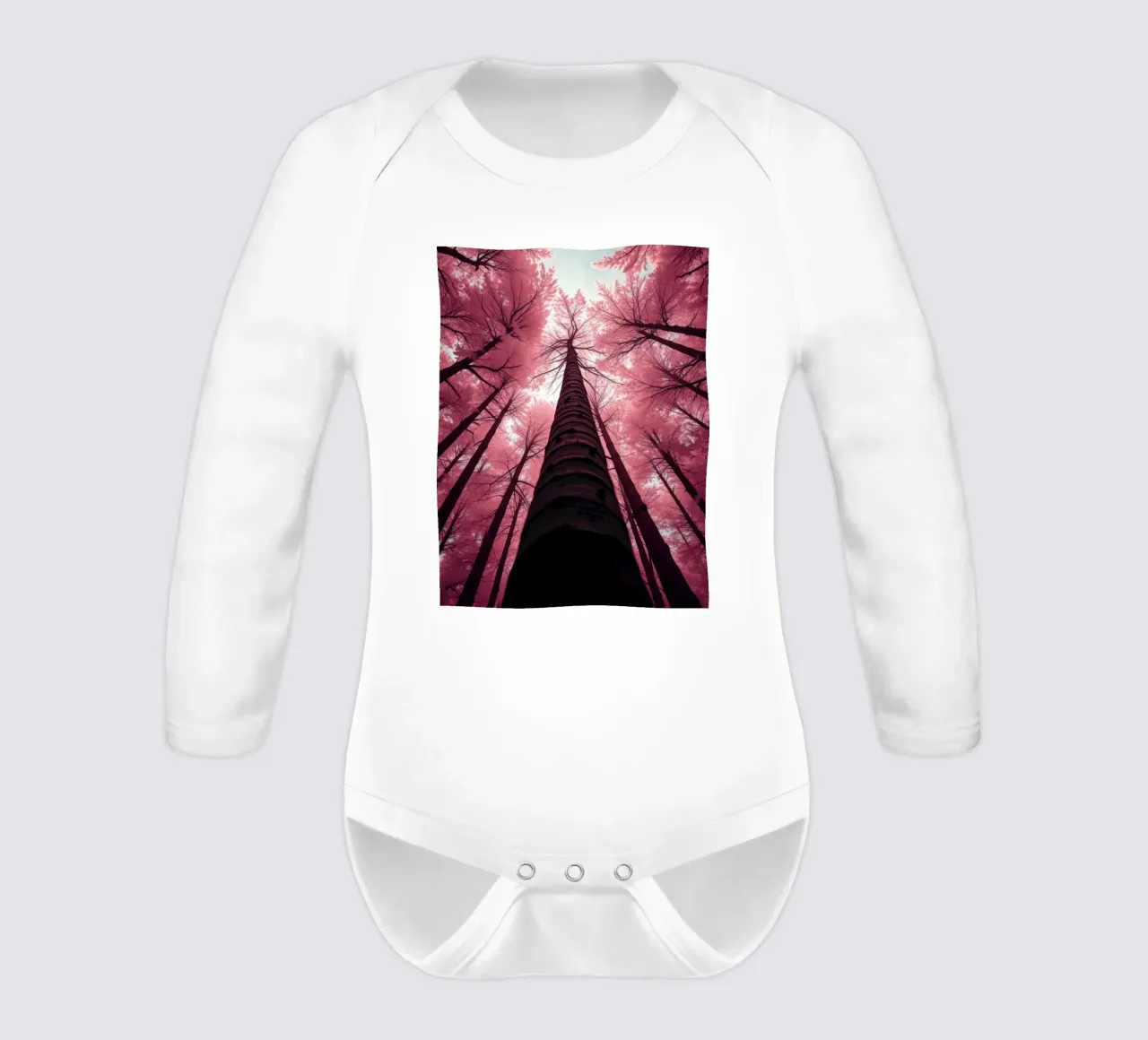 Tall trees stretch towards a pink sky creating a dreamy long-sleeve baby romper by DesignDoodle