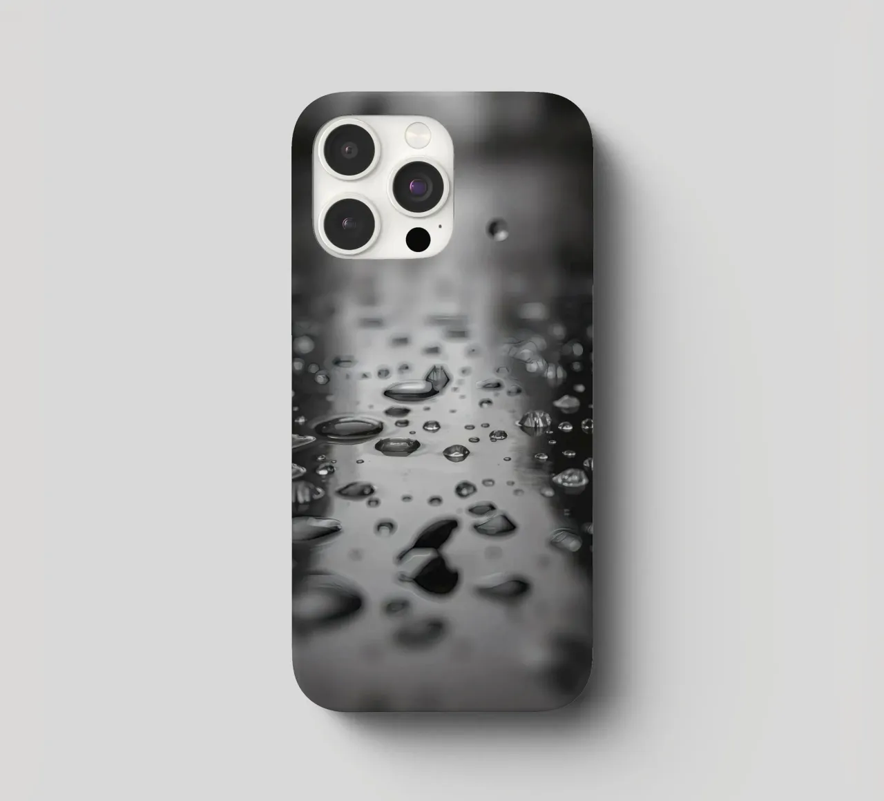 Raindrops creating reflections on a wet surface iphone case by DesignDoodle