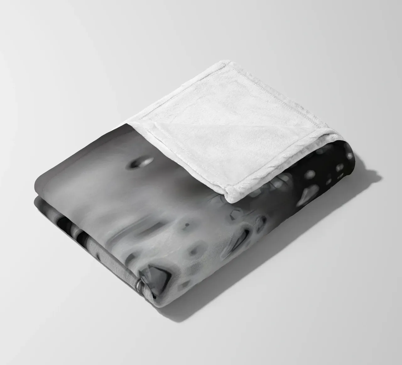 Raindrops creating reflections on a wet surface fleece blanket by DesignDoodle