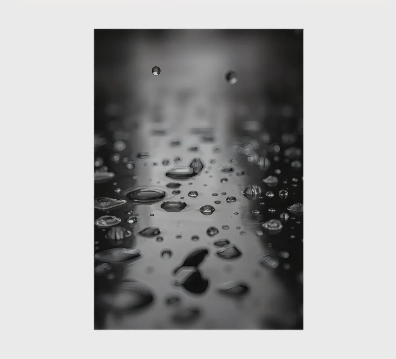 Raindrops creating reflections on a wet surface notebook by DesignDoodle