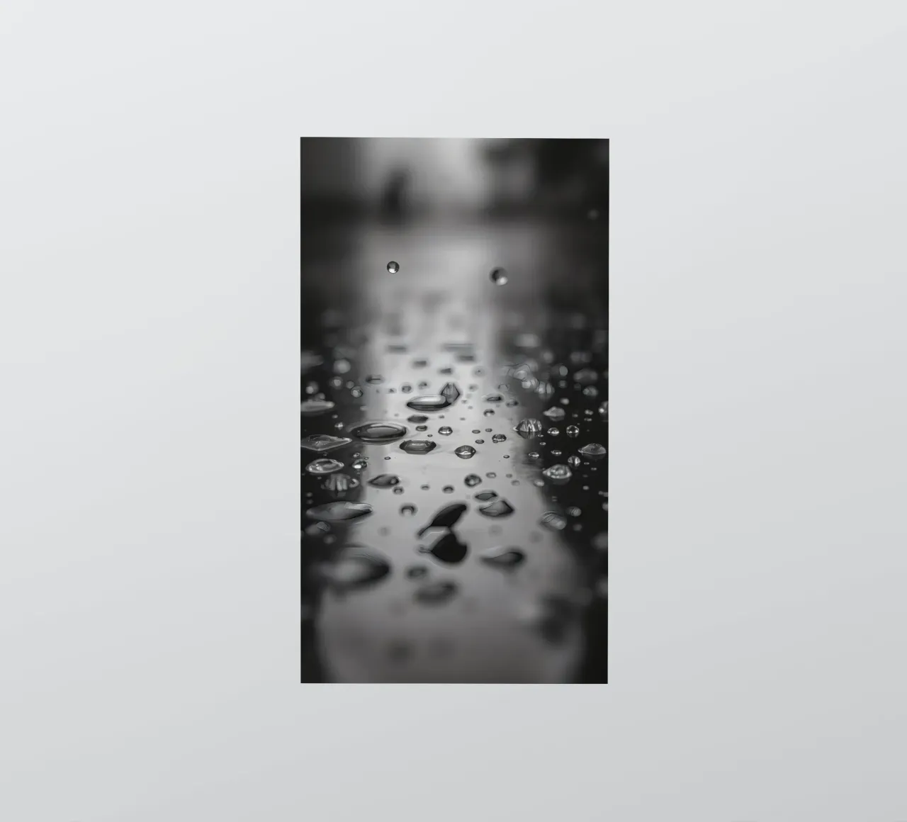 Raindrops creating reflections on a wet surface sticker by DesignDoodle