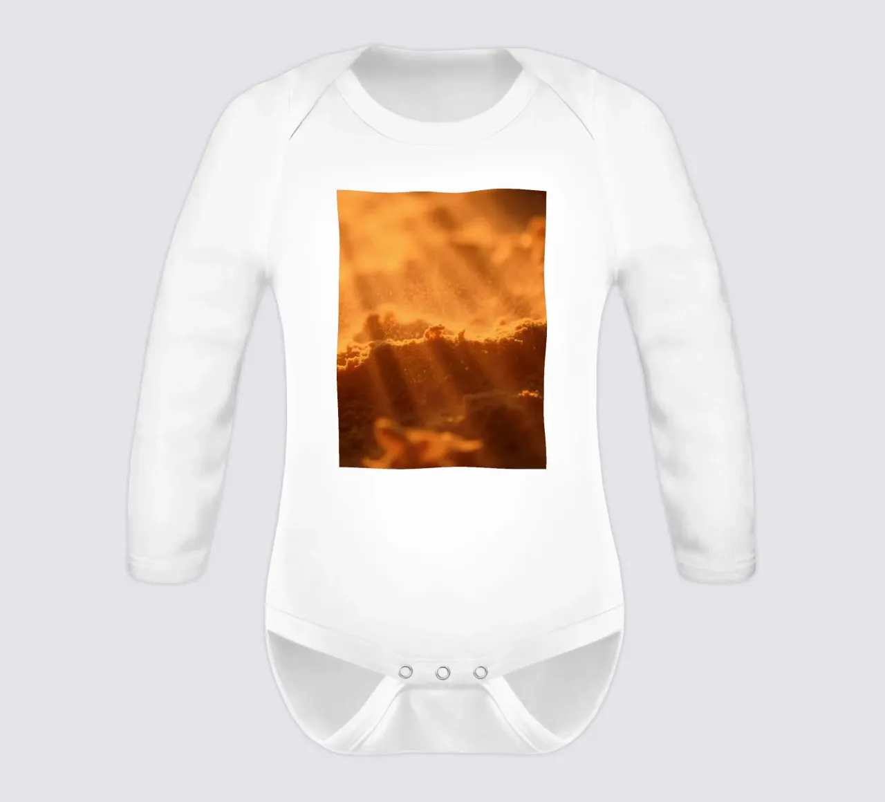 Sandy texture illuminated by soft light creating a warm feel long-sleeve baby romper by DesignDoodle