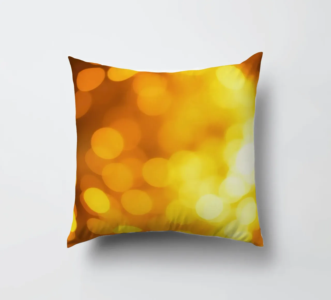 golden bokeh background design featuring abstract shimmerin decorative cushion by DesignDoodle